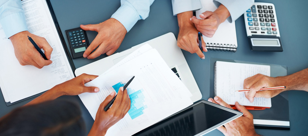 businesswoman and shis team isolated over a white background
